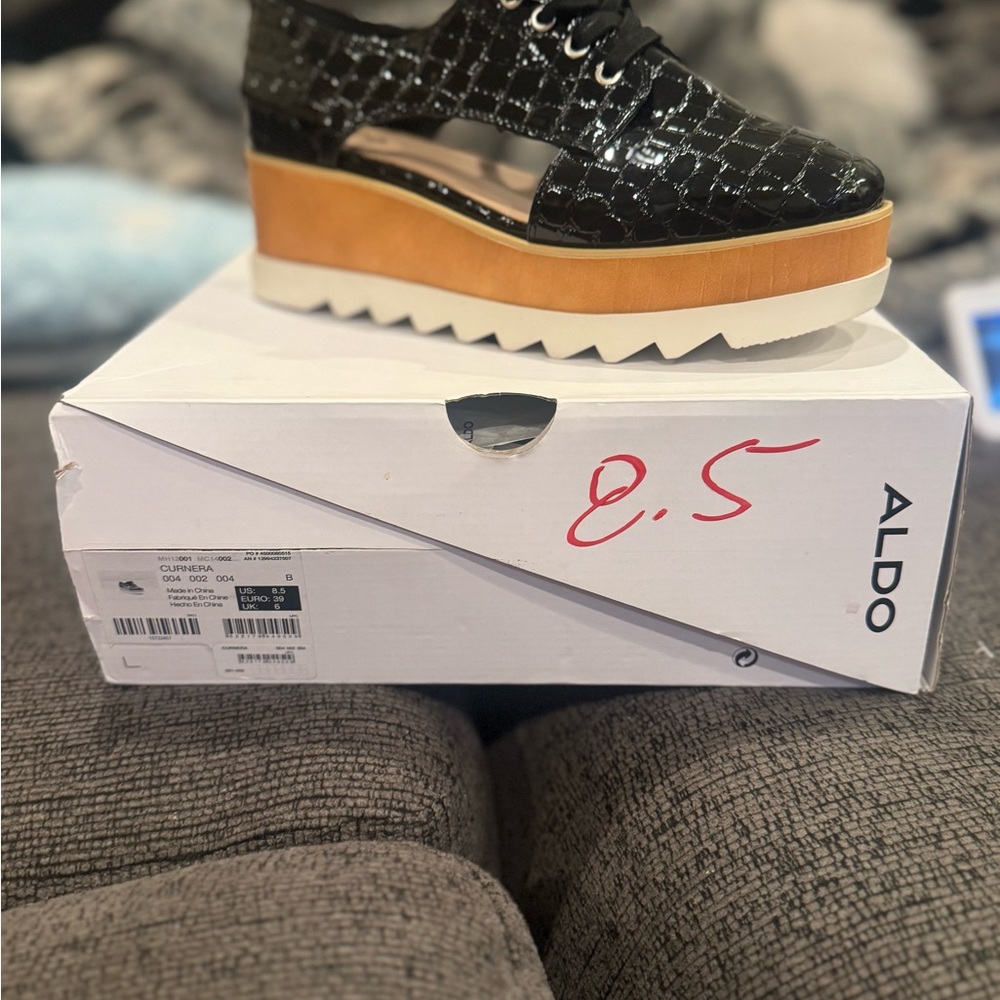 Aldo Black and Tan Platform Shoes